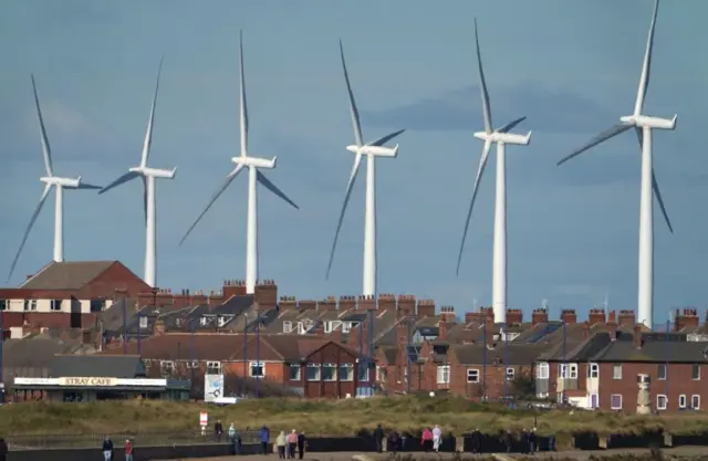 Wind turbines over a town in north Yorkshire