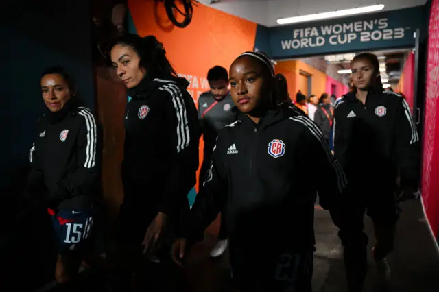 Costa Rica stand in the tunnel before heading to warm up.