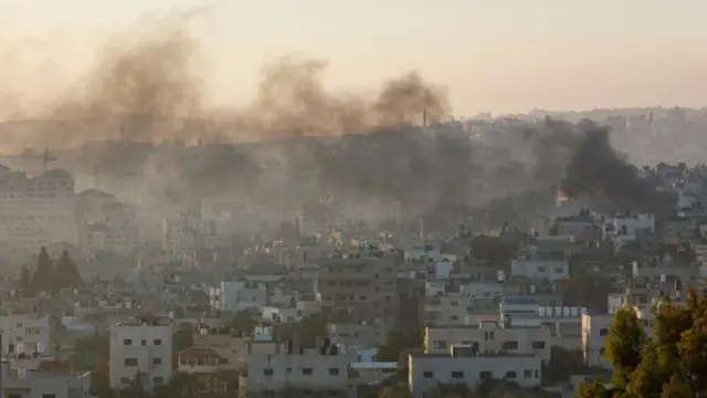 Smoke rises amid an Israeli military operation, in Jenin,