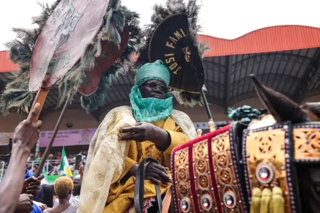 An elder from the Josi family in Ijebu is seen on a horse during the horse parade at the Ojude Oba festival in Ijebu, Ogun state, Nigeria on 30 June.