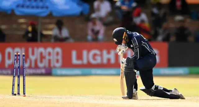 Tomas Mackintosh looks dejected after being run out