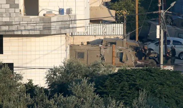 Israeli soldiers take position