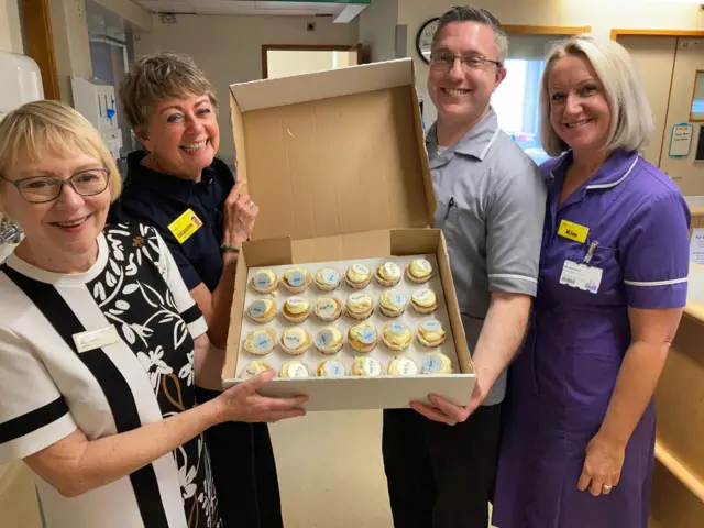 St George's Hospital staff distributing cupcakes