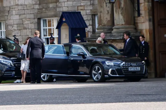 Queen Camilla gets into a car at the Palace of Holyroodhouse