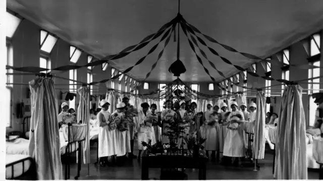 A maternity ward at Christmas 1920