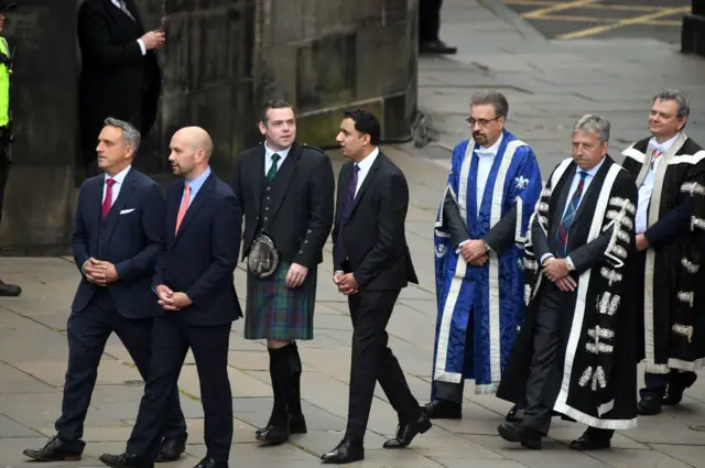 Douglas Ross and Anas Sarwar chat as they arrive at St Giles' Cathedral