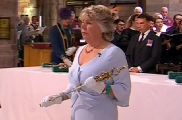 Lady Dorrian holds the sceptre