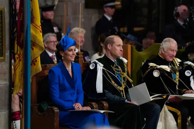 Catherine, Princess of Wales, and William, Prince of Wales, share a lighter moment with King Charles