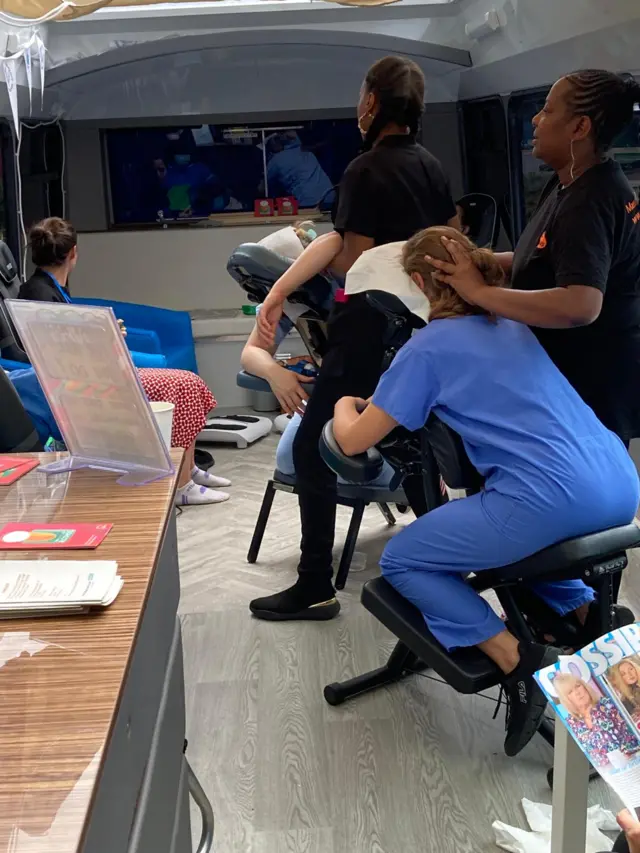 Masseurs help staff at Charing Cross Hospital