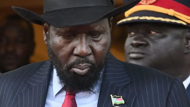 South Sudan's President Salva Kiir (L) looks on as he waits for the arrival of Pope Francis at the Presidential Palace in Juba, South Sudan, on February 3, 2023.