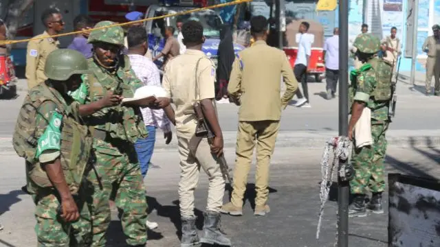 ecurity forces take security measures at the area after bomb attack during the passage of an African Union Transition Mission in Somalia (ATMIS) convoy in Mogadishu, Somalia on April 03, 2023