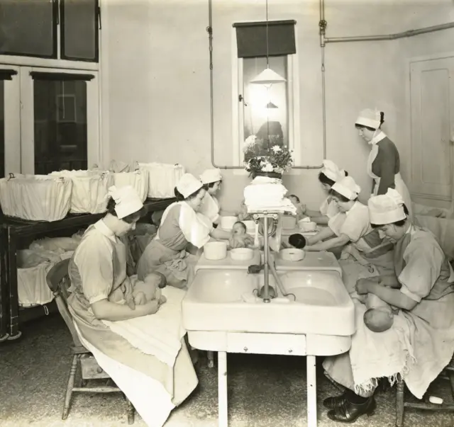 Newborns being bathed in 1915