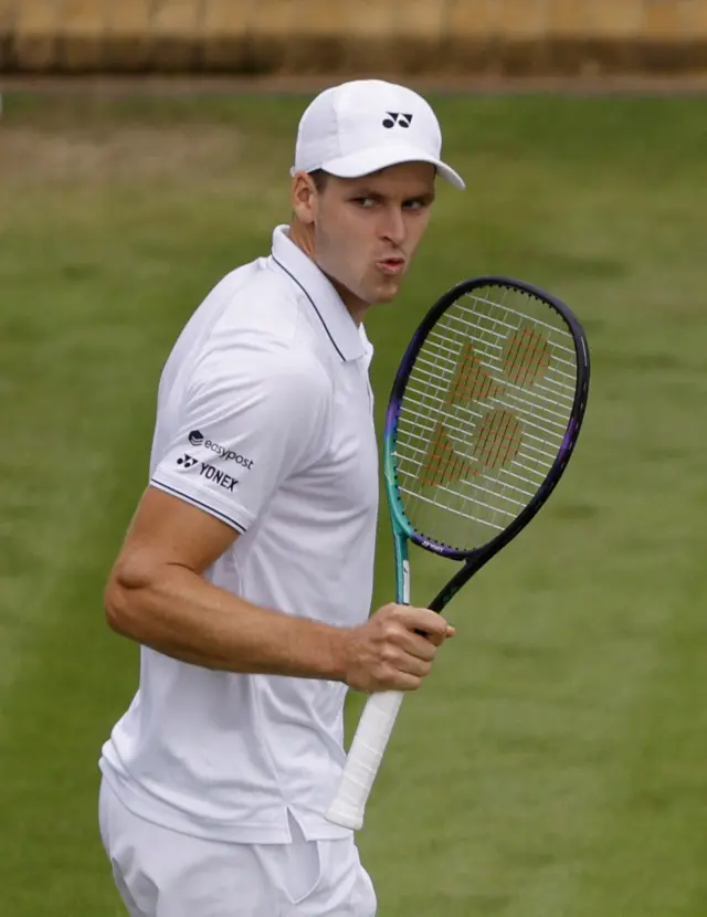 Hubert Hurkacz celebrates on court 18