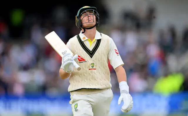 Australia batter Marnus Labuschagne looks dejected as he walks off after being dismissed