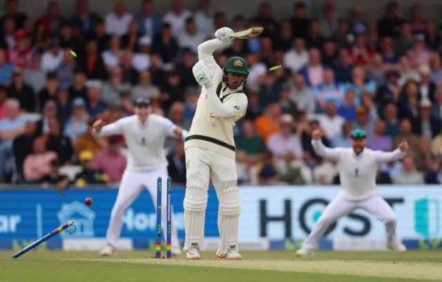 Usman Khawaja is bowled by Mark Wood (not pictured)