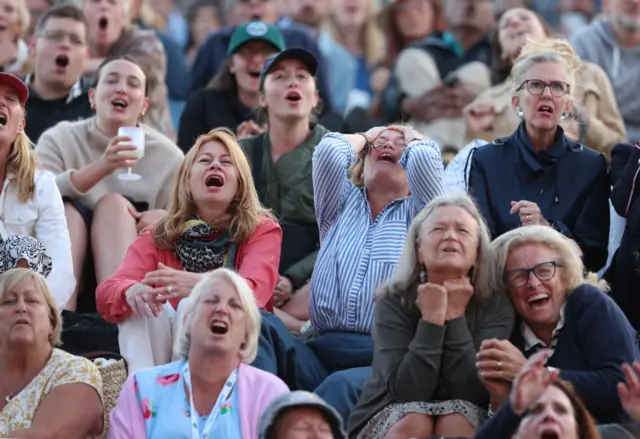 Fans watch from Henman Hill at Wimbledon