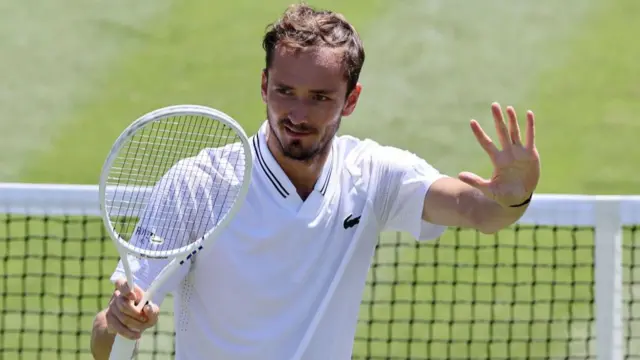 Daniil Medvedev celebrates beating Adrian Mannarino