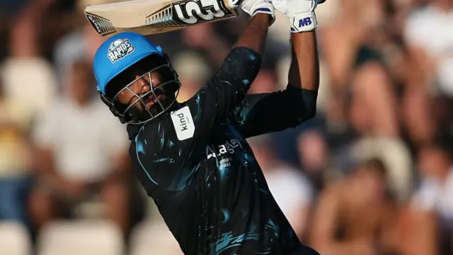 Usama Mir hits a six