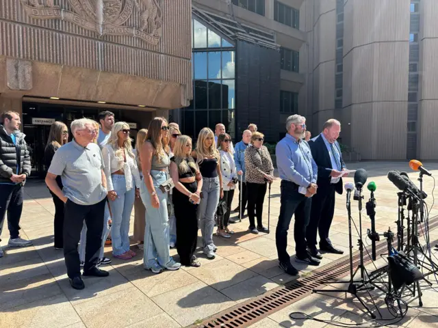 Speakers read statements outside Liverpool Crown Court