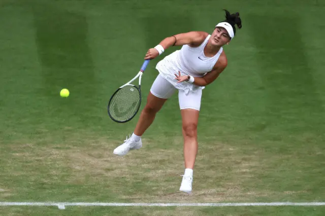 Bianca Andreescu serves the ball