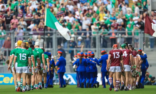 The players on the pitch ahead of the All-Ireland hurling semi-final