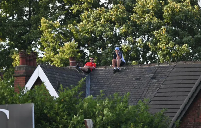 Fans watch Ashes at Headingley from roof of nearby house