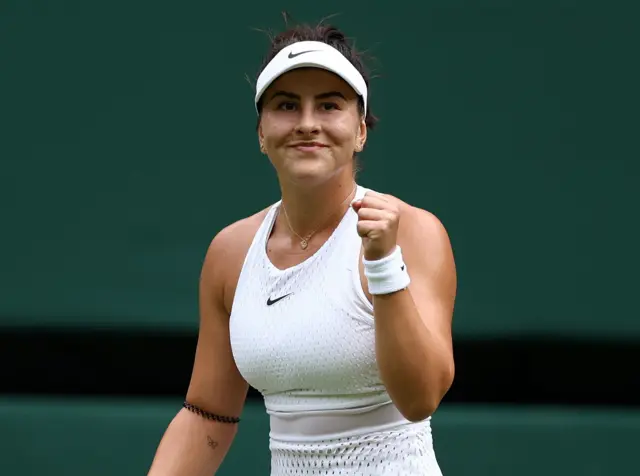 Bianca Andreescu smiles and clenches fist in celebration