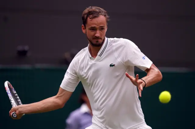 Daniil Medvedev hits a forehand shot