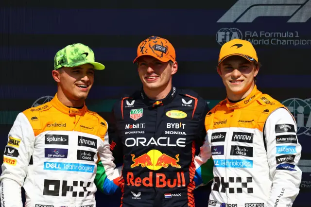 Lando Norris, Max Verstappen and Oscar Piastri pose for pictures after qualifying at Silverstone