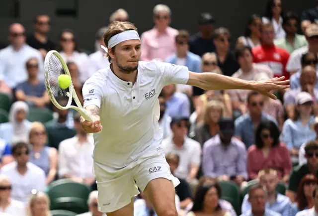 Alexander Bublik plays a forehand