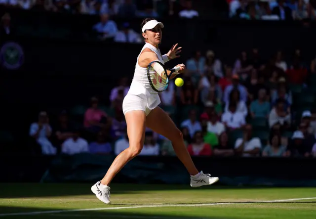 Belinda Bencic hits a forehand