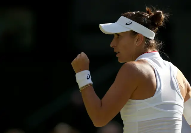 Belinda Bencic pumps her fist in celebration