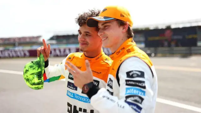 Lando Norris and Oscar Piastri pose together after Silverstone qualifying