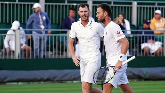 Jamie Murray and Michael Venus in action at Wimbledon