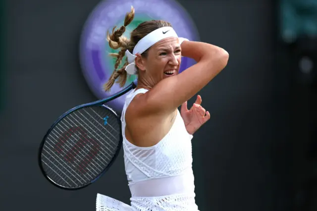 Victoria Azarenka hits a forehand shot