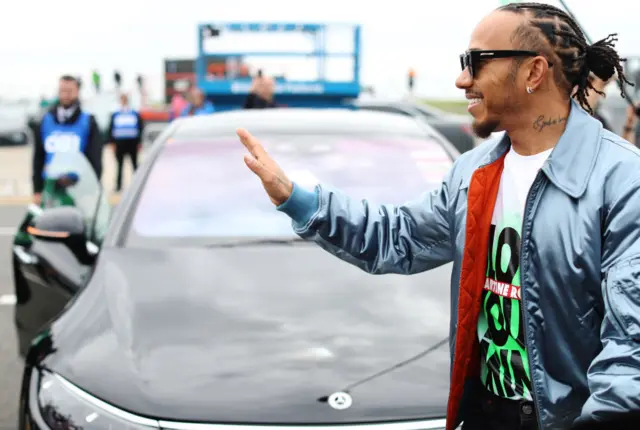 Lewis Hamilton greets fans at Silverstone