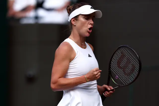 Elina Svitolina pumps her fist in celebration