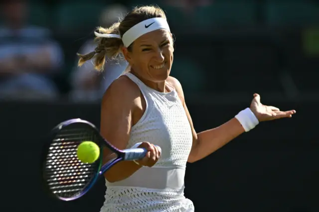 Victoria Azarenka hits a forehand