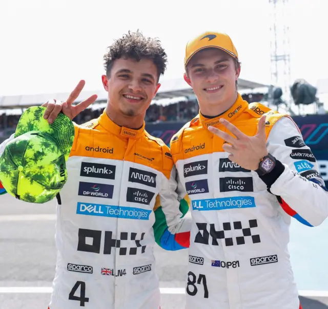 Lando Norris and Oscar Piastri celebrate after qualifying