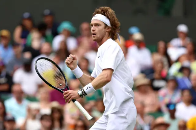 Andrey Rublev pumps his fist in celebration