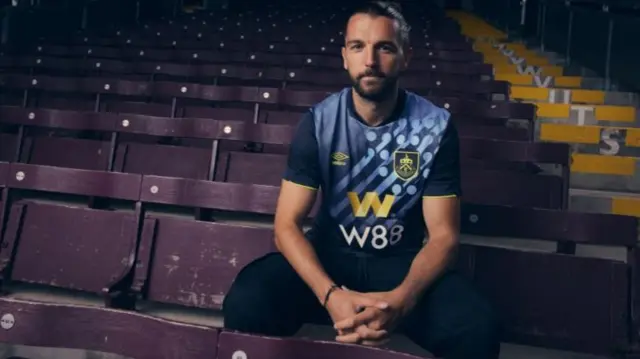 Jay Rodriguez models Burnley's third kit