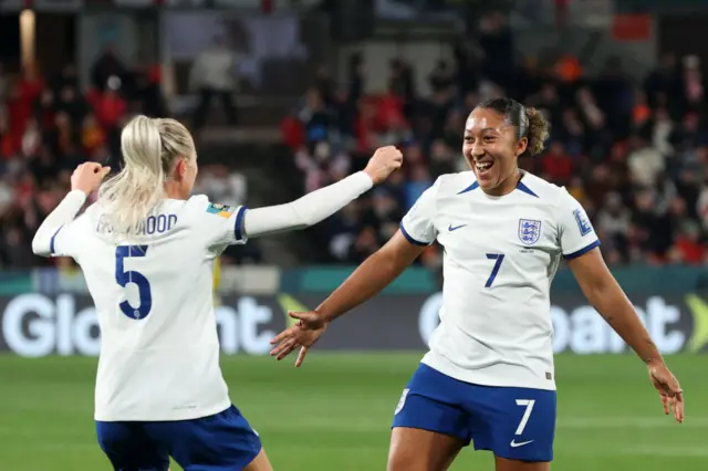 Lauren James celebrates scoring for England