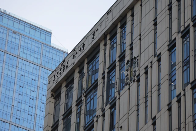 Damage to office building facade