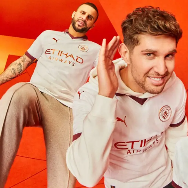 Kyle Walker and John Stones in the new Manchester City away kit