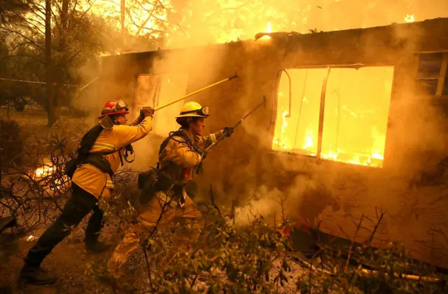 Firefighters battling a 2018 blaze in northern California