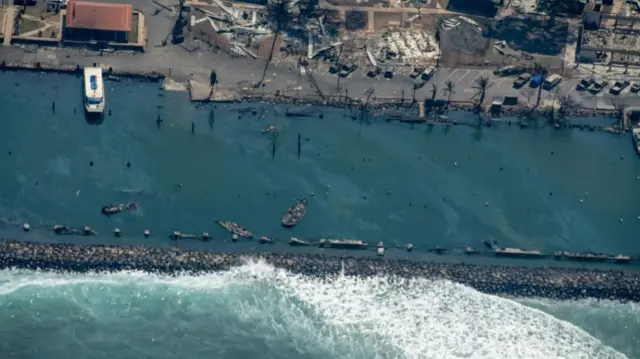 An aerial photo made available by the Hawaii Wing Civil Air Patrol shows an aerial view of damage caused by the brush fires in Maui on 9 August 2023