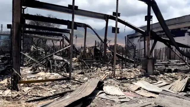 The burned shell of a building, one of many in view