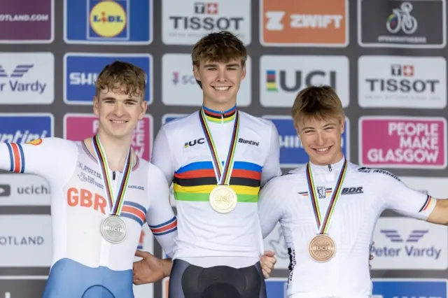 Ben Wiggins, Oscar Chamberlain and Louis Leidert on the podium after the Men's Junior Individual Time Trial at the 2023 Cycling World Championships