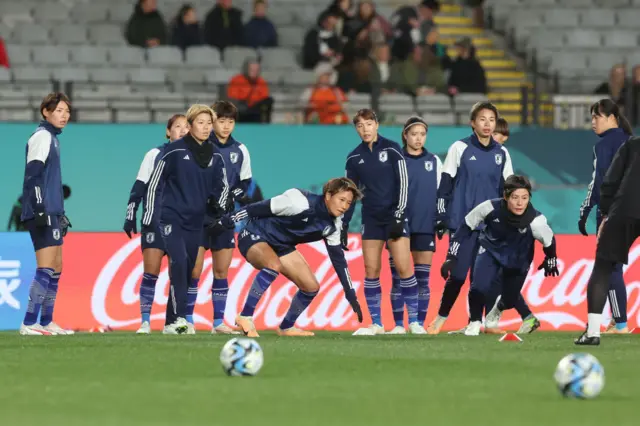 Japan players warm up