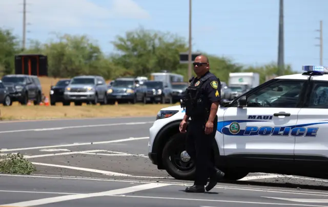 police man by his car